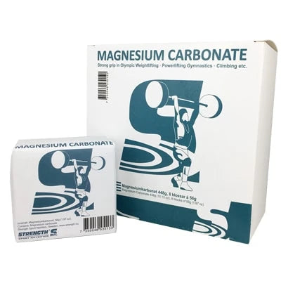 Strength Sport Nutrition Magnesium Carbonate 60 g valkoisessa paperipakkauksessa, jossa on sininen painonnostajan kuvitus., kuva 1/1
