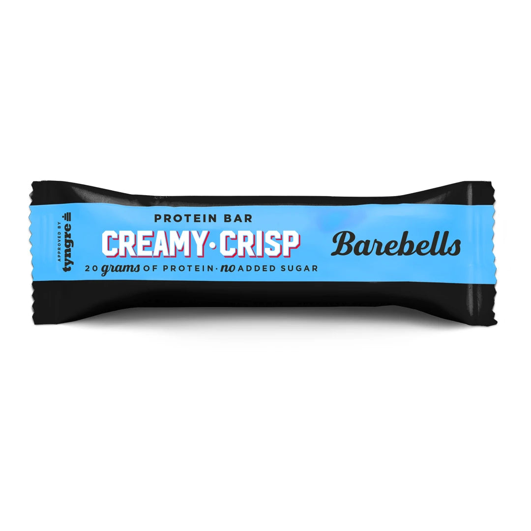 Barebells Soft protein bar 55 g Creamy Crisp mustassa ja vaaleansinisessä pakkauksessa., kuva 3/21