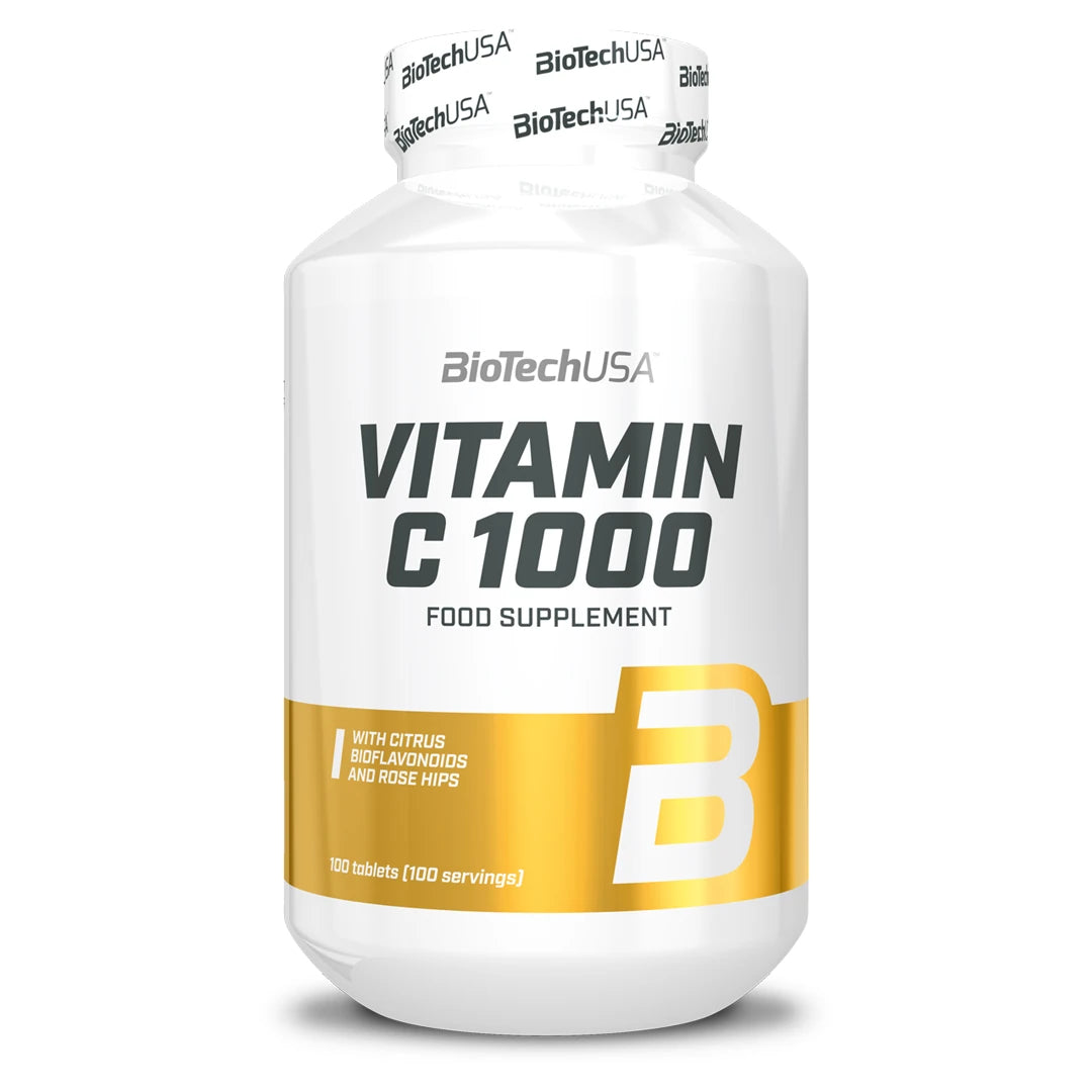 BioTechUSA Vitamin C 1000 100 tabs -vitamiini valkoisessa purkissa kultaisilla yksityiskohdilla., kuva 1/1
