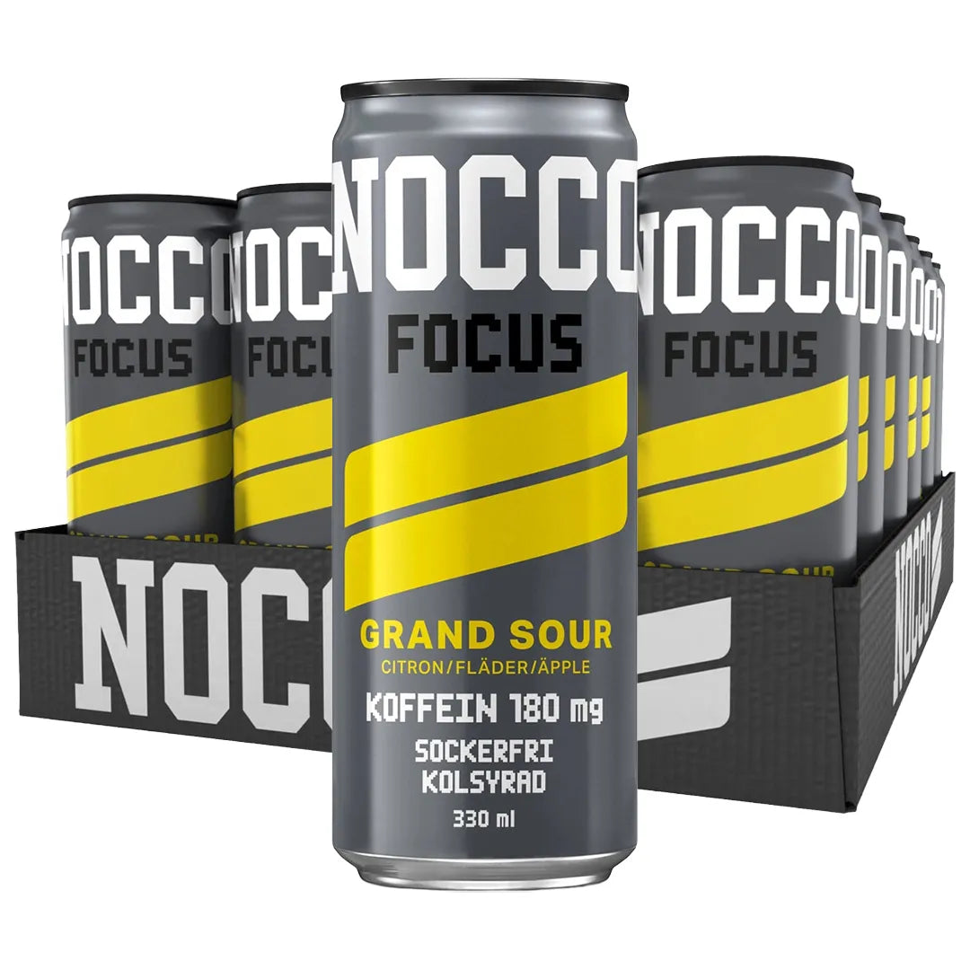 24 x NOCCO FOCUS 330 ml Grand Sour mustassa laatikossa harmaita energiajuomatölkkejä keltaisilla yksityiskohdilla., kuva 1/1