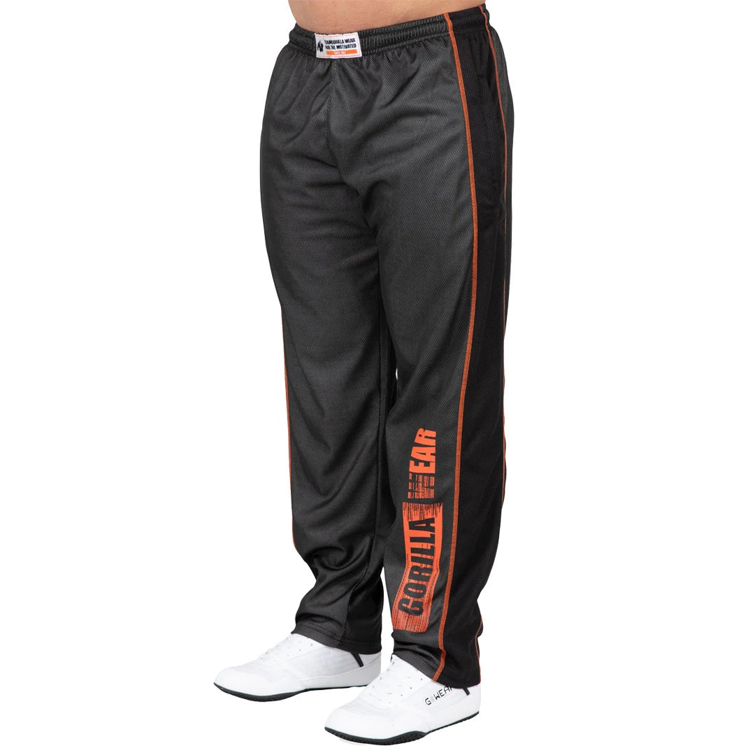 Harmaat verkkokankaiset Gorilla Wear Wallace Mesh Pants Grey/Orange -treenihousut oransseilla tikkauksilla ja logolla., kuva 3/4