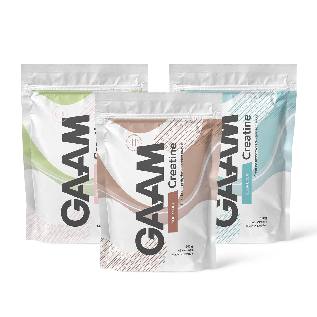 3 x GAAM Creatine 300 g kolmessa valkoisessa pussissa ruskeilla, vihreillä ja sinisillä yksityiskohdilla eri mauille., kuva 1/1
