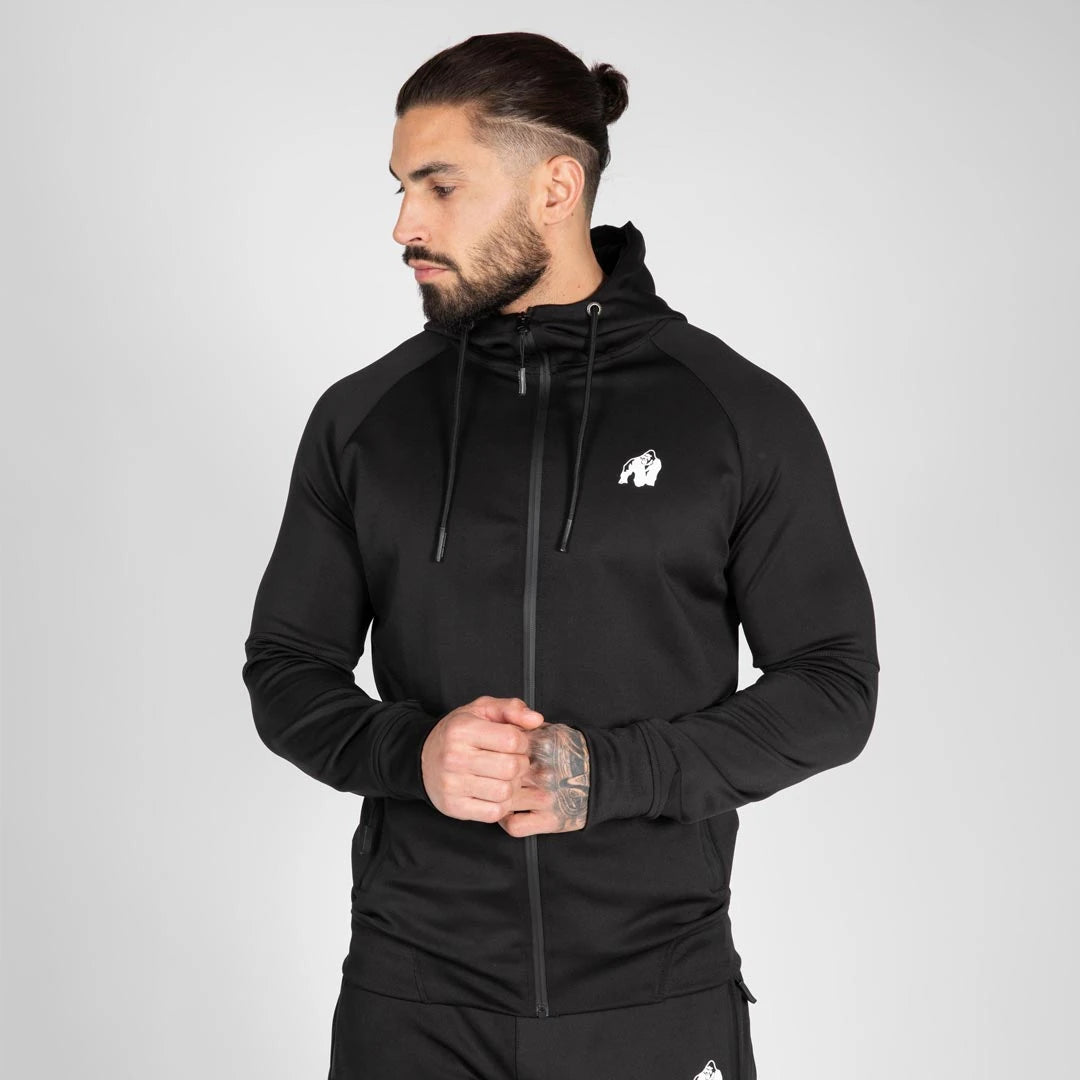 Gorilla Wear Sullivan Track Jacket Black on musta slim-fit-treenitakki hupulla, vetoketjulla ja valkoisella logolla., kuva 2/7