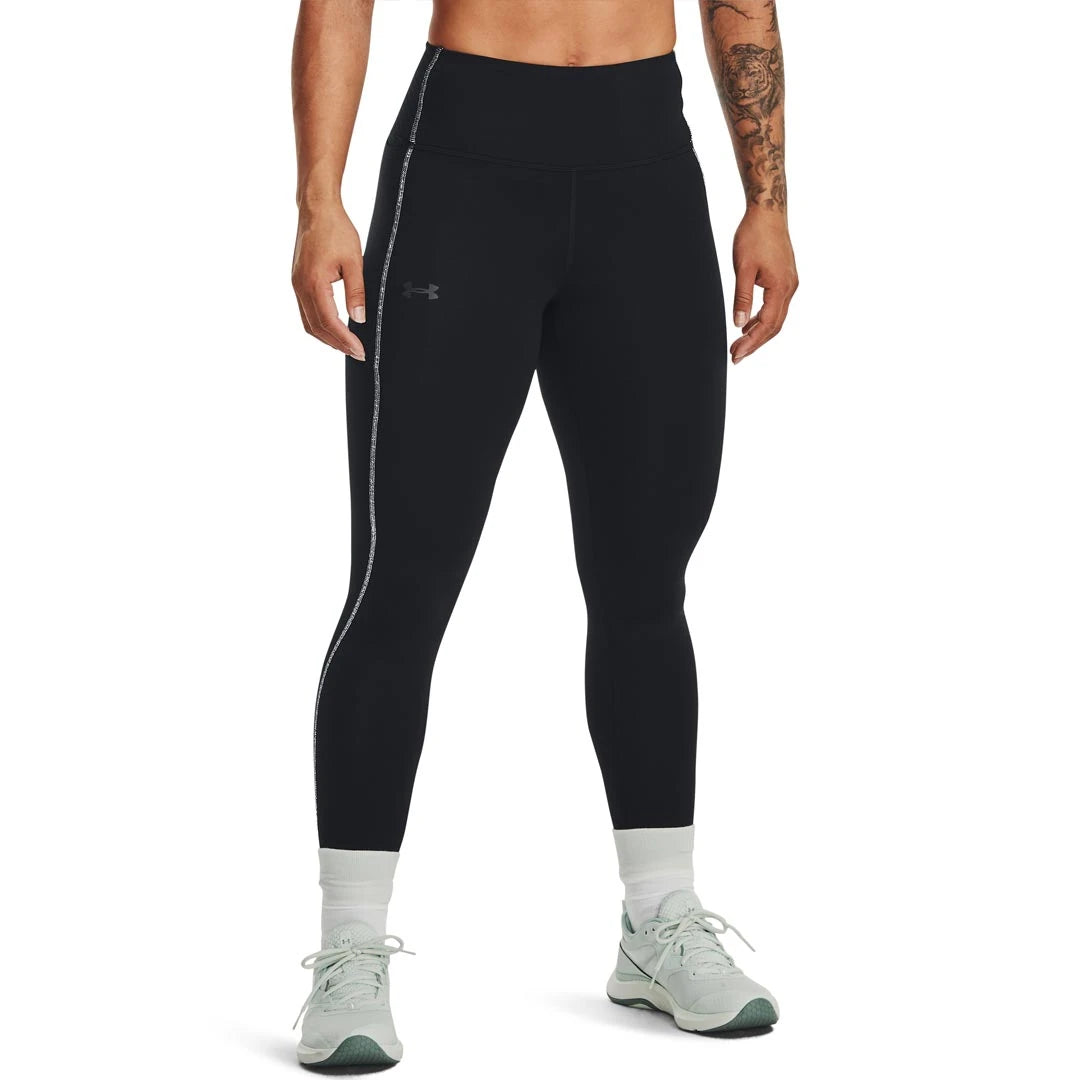 Under Armour Train CW Legging Black/Jet Grey är svarta träningstights för dam med hög midja och grå sidodetalj.