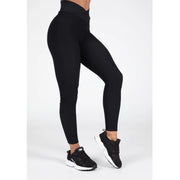 Gorilla Wear Dorris Leggings black är svarta träningstights med v-formad crossover-midja och vågstrukturerat tyg.