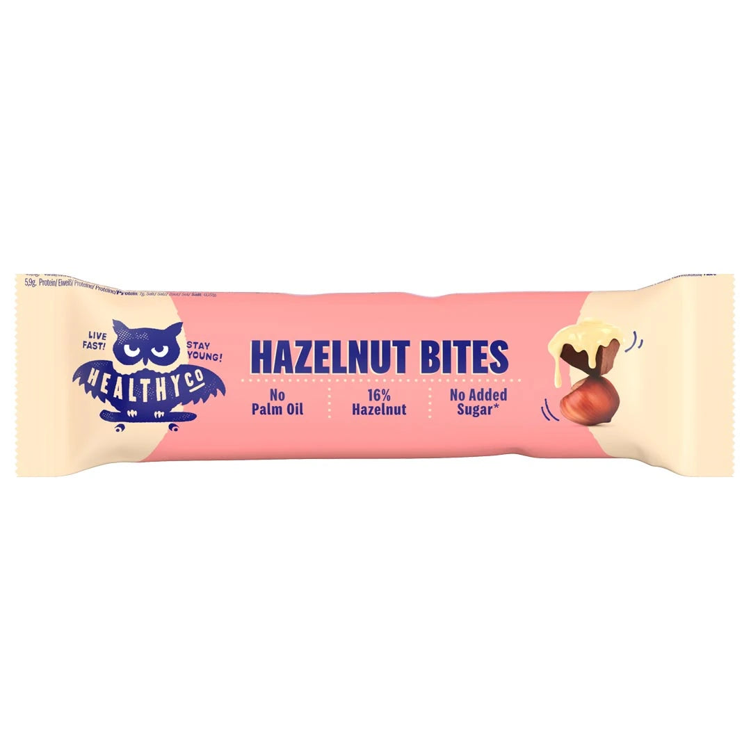 HealthyCo Hazelnut Bites 21 g -suklaapala vaaleanpunaisessa ja beigessä kääreessä tummansinisellä tekstillä., kuva 1/1