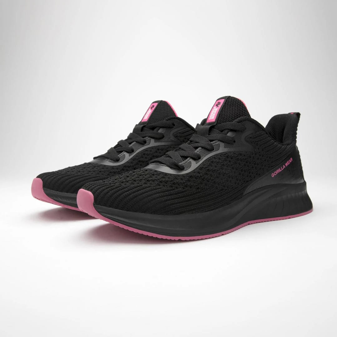 Mustat Gorilla Wear Milton Training Shoes Black/Fuchsia -treenikengät vaaleanpunaisilla yksityiskohdilla.