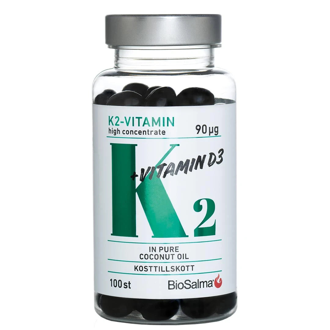BioSalma K2-vitamin High Concentrate 90 µg 100 caps läpinäkyvässä hopeakantisessa purkissa, jossa on tummia kapseleita., kuva 1/1