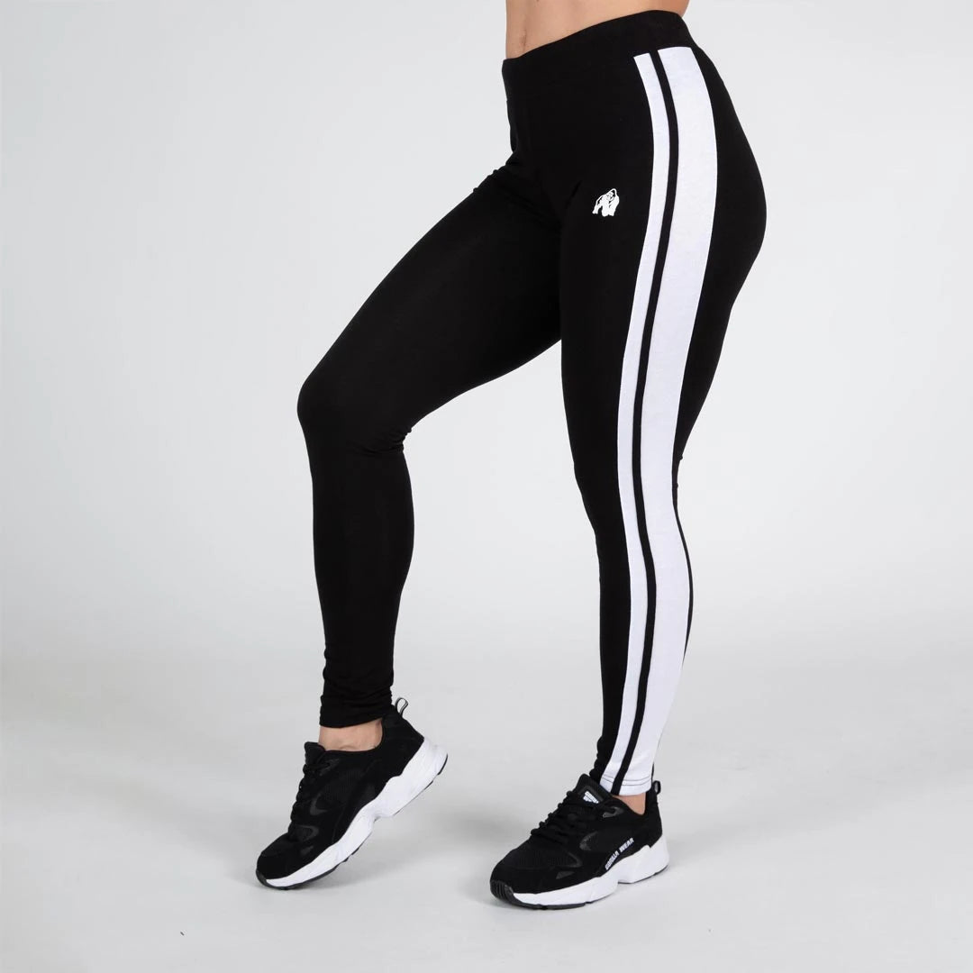 Gorilla Wear Hailey Leggings Black, svarta träningstights i bomullsblandning med tight passform och vita sidorevärer.