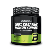 BioTechUSA 100% Creatine Monohydrate 500 g -kreatiinijauhe mustassa purkissa vihreillä yksityiskohdilla, makuna maustamaton.