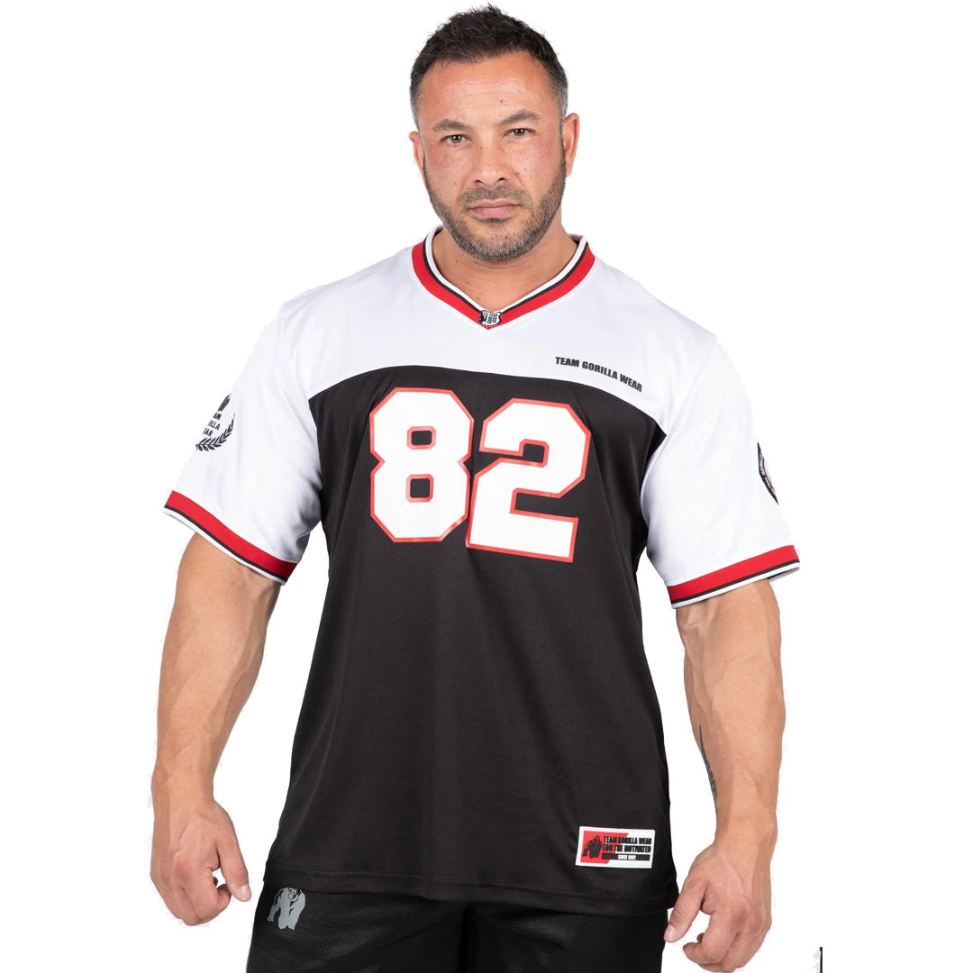Mustavalkoinen Gorilla Wear Trenton Football Jersey Black/White -t-paita polyesteriverkkoa 82-painatuksella.