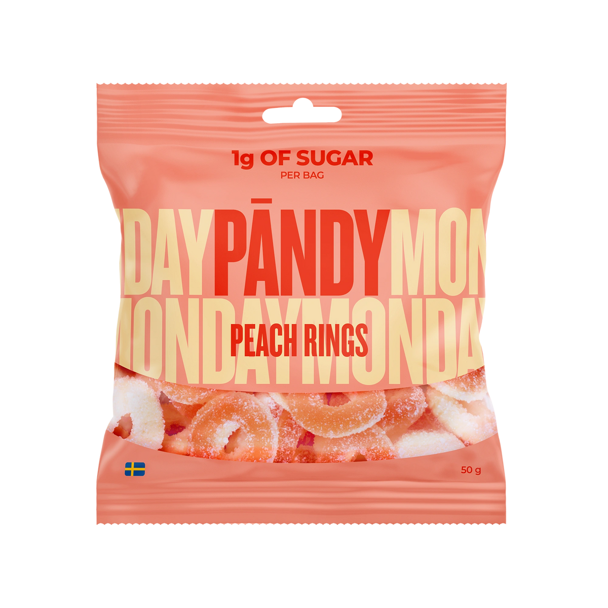 Pändy Candy Peach Rings 50 g persikanvärisessä pussissa, joka on täynnä pehmeitä hyytelö- ja vaahtorenkaita.