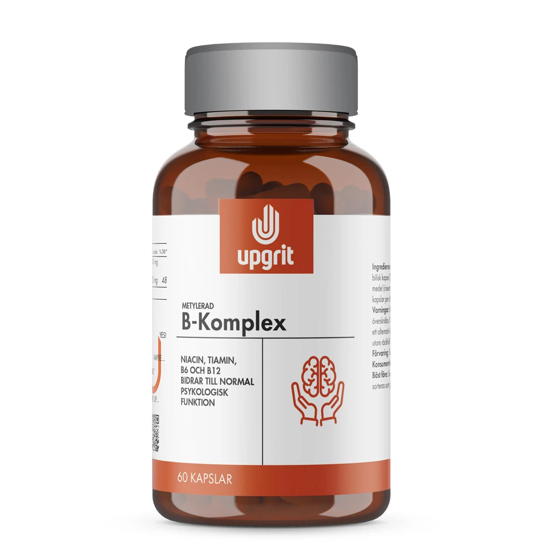 Upgrit B-Komplex 60 kapselia tummanruskeassa purkissa, jossa on hopeinen kansi ja valko-oranssi etiketti., kuva 1/1