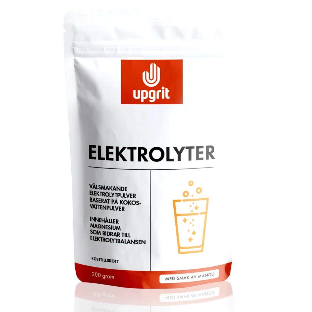 Upgrit Elektrolyytit 200 g -elektrolyyttijauhe valkoisessa pussissa oransseilla yksityiskohdilla, makuna mango.