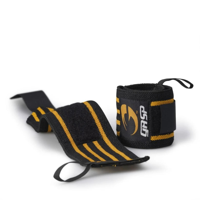 Gasp Hardcore Wrist Wraps Black, mustat rannetuet oransseilla raidoilla ja peukalolenkillä raskaisiin nostoihin.