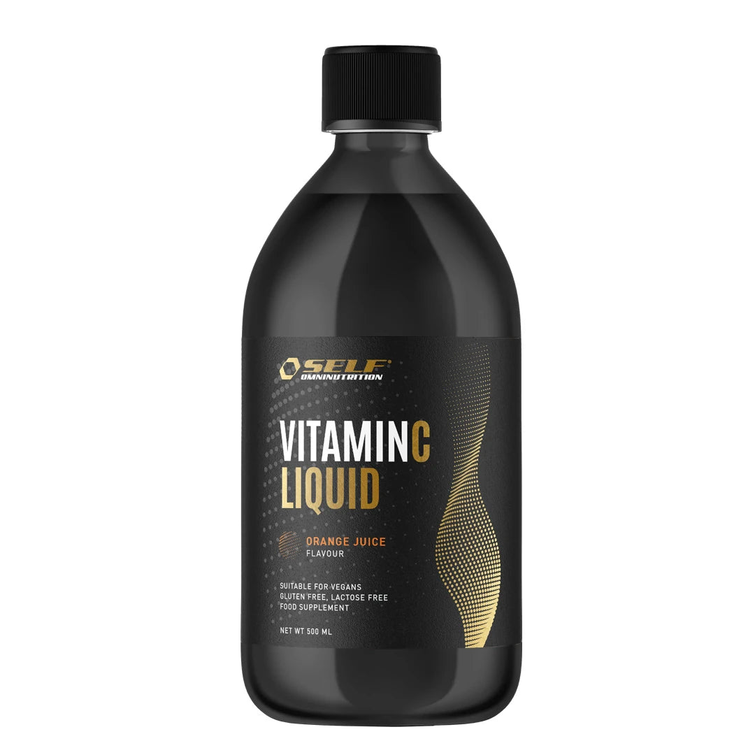 Musta pullo nestemäistä Self Omninutrition Vitamin C Liquid 500 ml -C-vitamiinia oranssein ja kultaisin yksityiskohdin., kuva 1/1