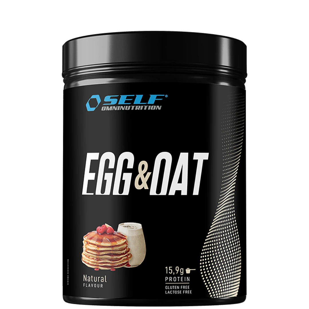 Musta purkki Self Omninutrition Egg &amp; Oat 480 g -jauhetta makuna Natural, jonka etupuolella on kuva pannukakuista., kuva 1/1