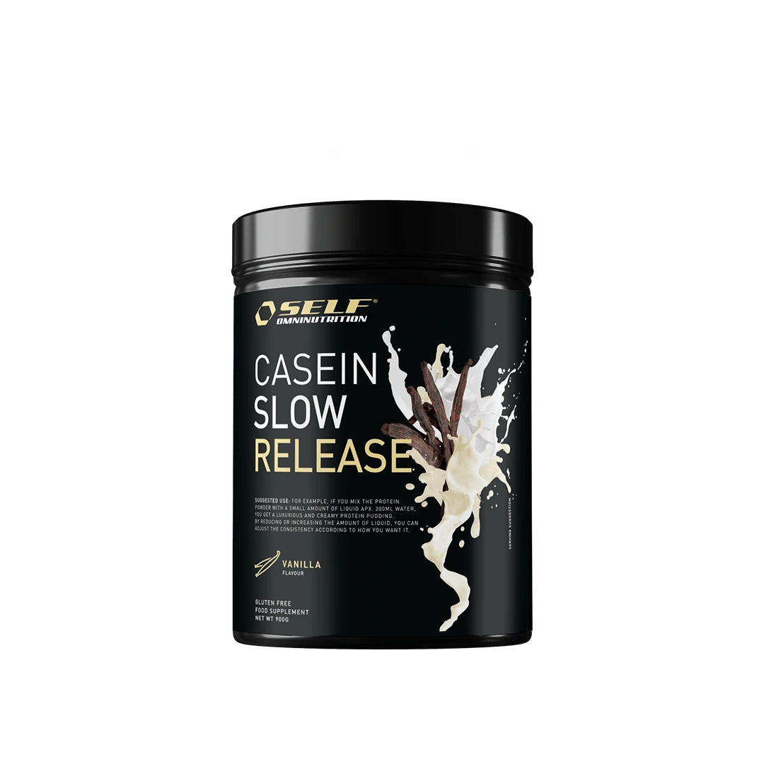 Self Omninutrition Casein 900 g -kaseiiniproteiinijauhe mustassa purkissa, jossa on kuvitus vaniljatangoista ja maitoroiskeista maulle Vanilla., kuva 2/2