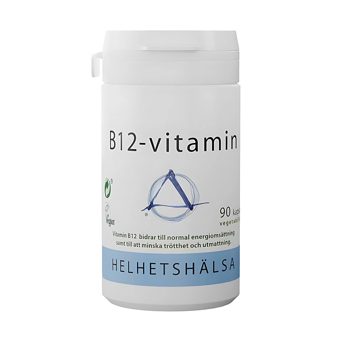 Helhetshälsa B12 Vitamin 90 caps -ravintolisä valkoisessa muovipurkissa vaaleansinisillä yksityiskohdilla.