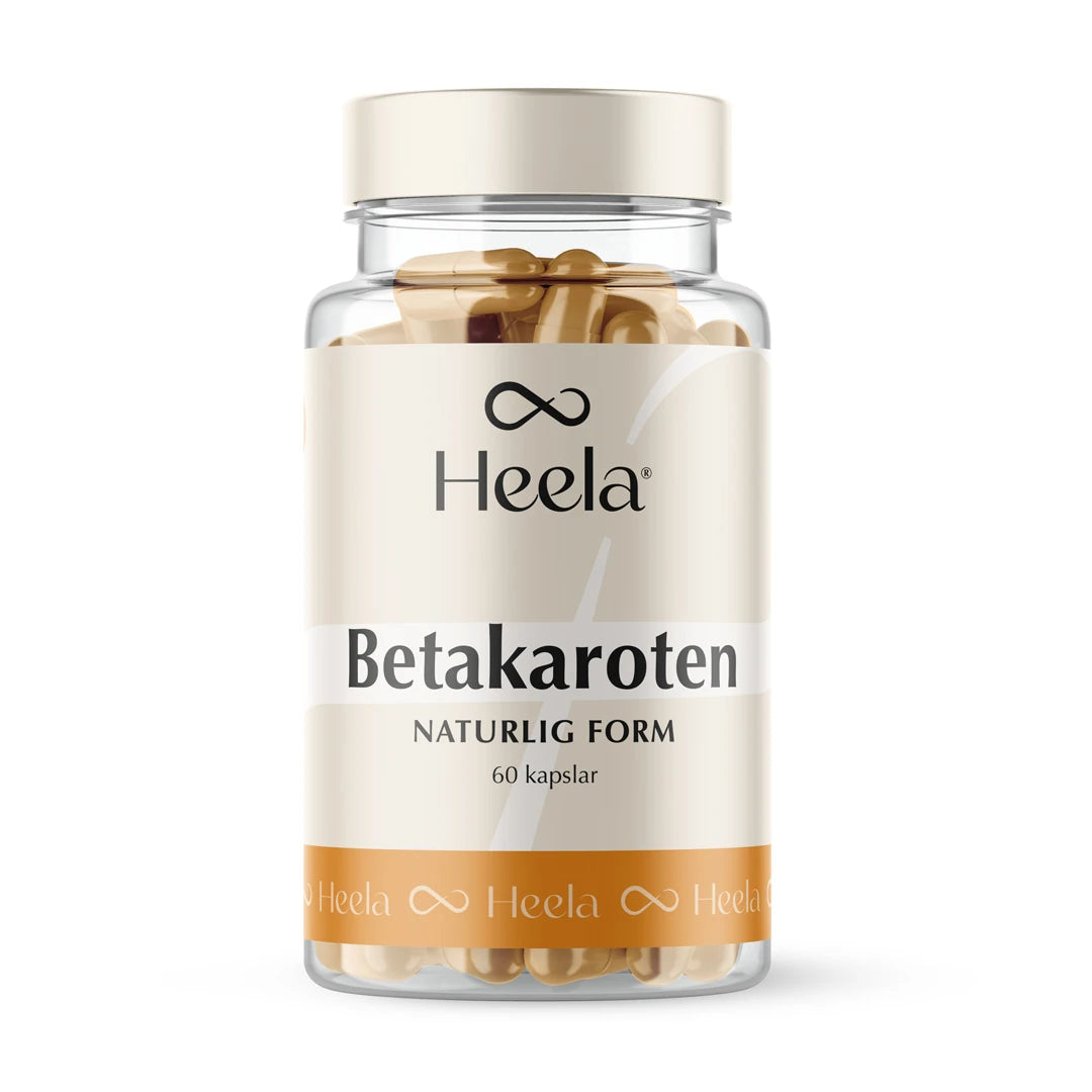 Heela Betakaroten 25 mg 60 caps läpinäkyvässä purkissa beigellä etiketillä, täynnä kullanvärisiä kapseleita., kuva 1/1