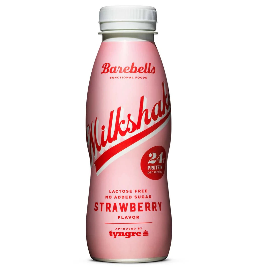 Barebells Milkshake 330 ml -proteiinijuoma vaaleanpunaisessa pullossa punaisella tekstillä, makuna Strawberry.