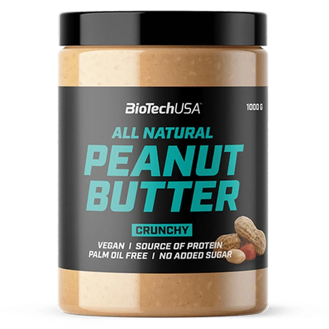 BioTechUSA Peanut Butter 1 kg läpinäkyvässä purkissa, jossa on musta etiketti ja turkoosi teksti, Crunchy-versiona., kuva 1/2