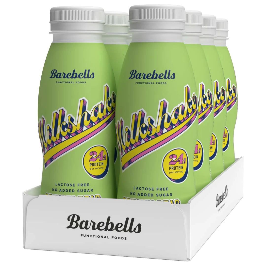 8 x Barebells Milkshake 330 ml Creamy Pear valkoisessa laatikossa, jossa on vaaleanvihreitä pulloja retrotekstillä., kuva 1/1