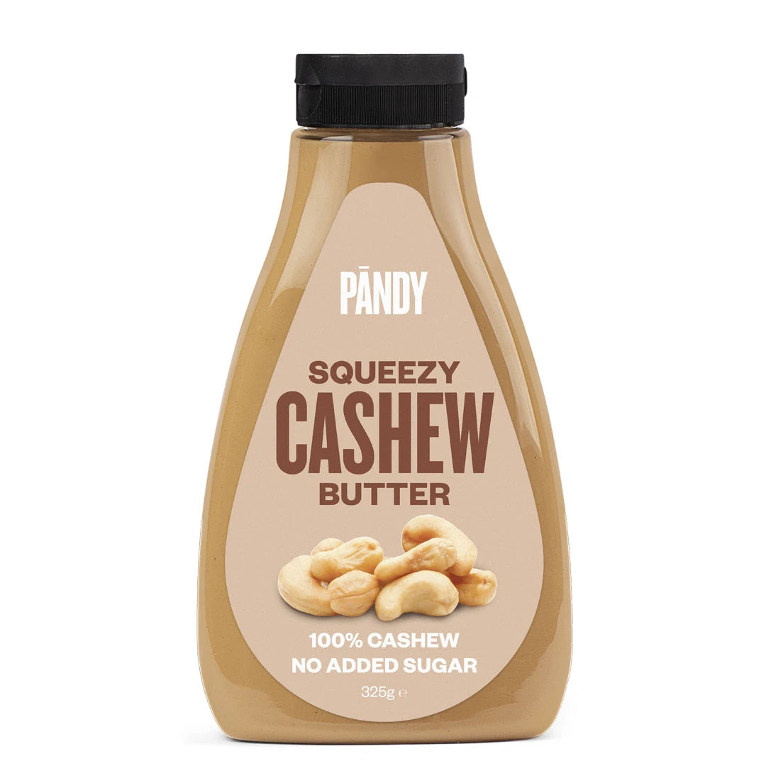 Pändy Squeezy 325 g Cashew Butter läpinäkyvässä puristepullossa, jossa on beige etiketti., kuva 2/2