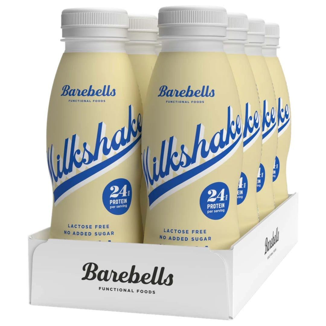 8 x Barebells Milkshake 330 ml Vanilla i ljusgula flaskor med blå text i en vit kartong., bild 1 av 1