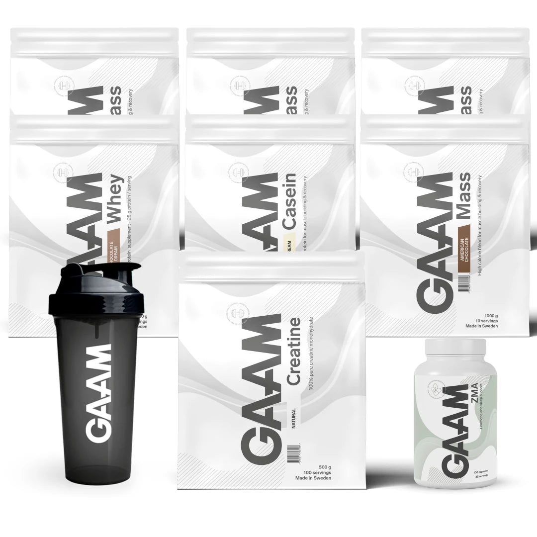 GAAM Complete Weight Gain Pack sisältää valkoisia lisäravinnepusseja, purkin sekä mustan shakerin.