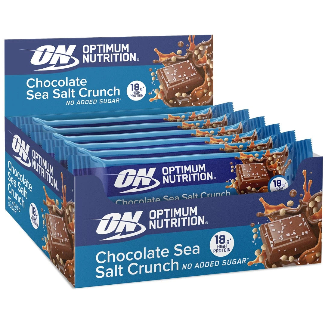 12 x Optimum Nutrition Chocolate Protein Bar 55 g Sea Salt Crunch sinisessä laatikossa suklaa- ja kinuskiyksityiskohdin., kuva 1/1