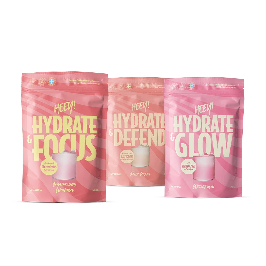 Heey! Hydration -paketti sisältää kolme vaaleanpunaista ja persikanväristä elektrolyyttijauhepussia.