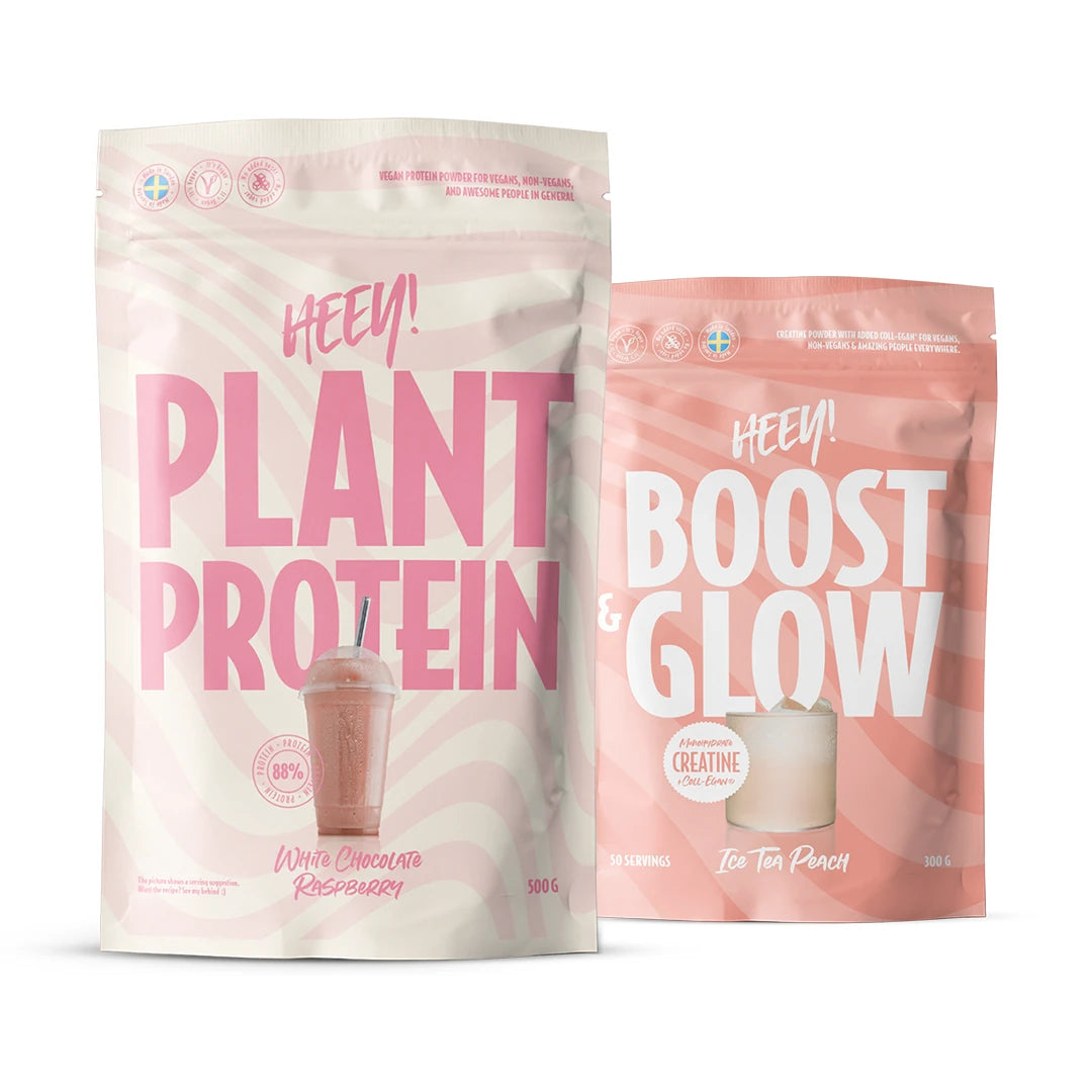 Heey! Workout paket med två ljusrosa och mönstrade påsar innehållande Plant Protein och Boost & Glow.