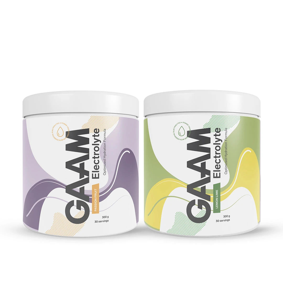 2 x GAAM Electrolyte 300 g kahdessa valkoisessa purkissa, joissa on liiloja ja vihreitä yksityiskohtia, makuina Passion Fruit ja Lemon Lime., kuva 1/1