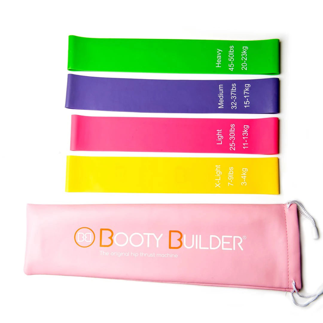 Neljä eriväristä Booty Builder Mini Bands Pink 4-Pack -treeninauhaa ja kätevä vaaleanpunainen säilytyspussi., kuva 1/1