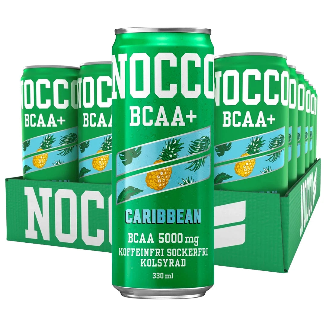 24 x NOCCO BCAA+ 330 ml Caribbean Koffeinfri vihreässä laatikossa vihreitä tölkkejä ananasyksityiskohdilla., kuva 1/1