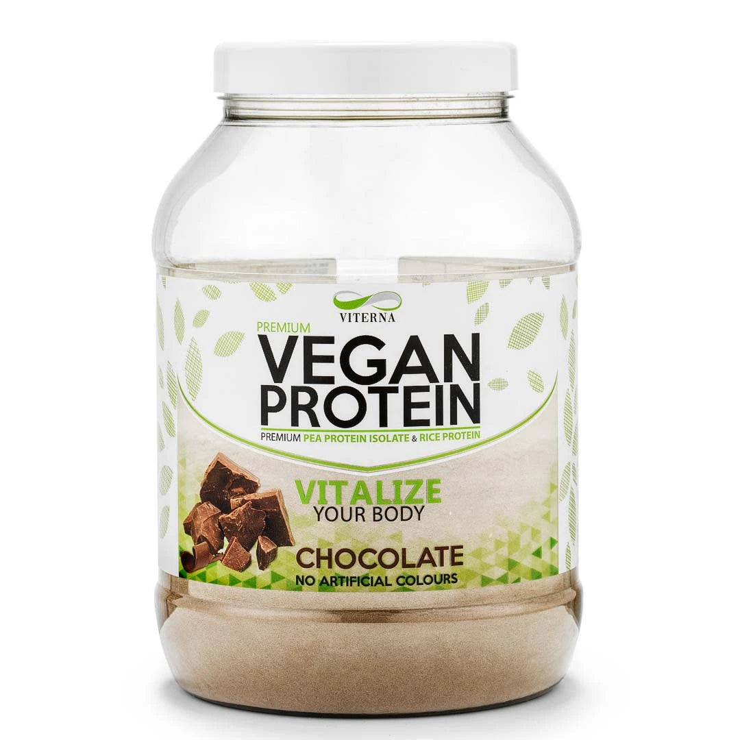 Viterna Vegan Protein 900 g läpinäkyvässä purkissa, jossa on valkoinen kansi ja vihreitä yksityiskohtia, makuna Chocolate., kuva 2/2