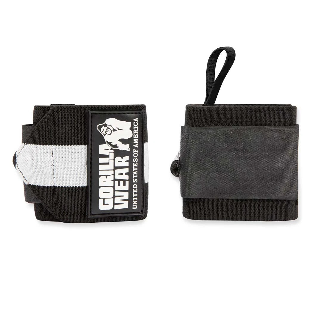 Gorilla Wear Wrist Wraps Ultra Black/White, mustavalkoiset joustavat rannesiteet logolla ja peukalolenkillä.
