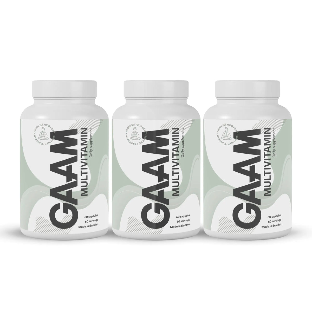 3 x GAAM Multivitamin 60 caps kolmessa valkoisessa purkissa, joissa on vaaleanvihreitä yksityiskohtia ja musta teksti etiketeissä., kuva 1/1